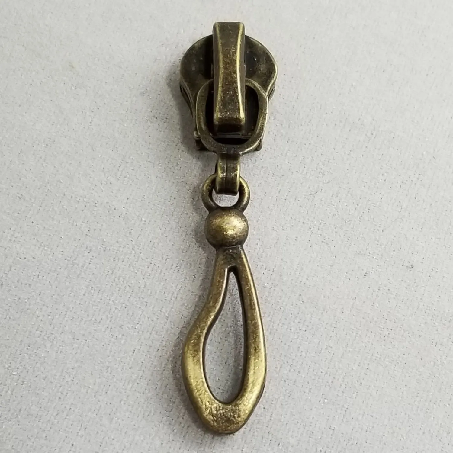 Abstract Metal Zipper Pull