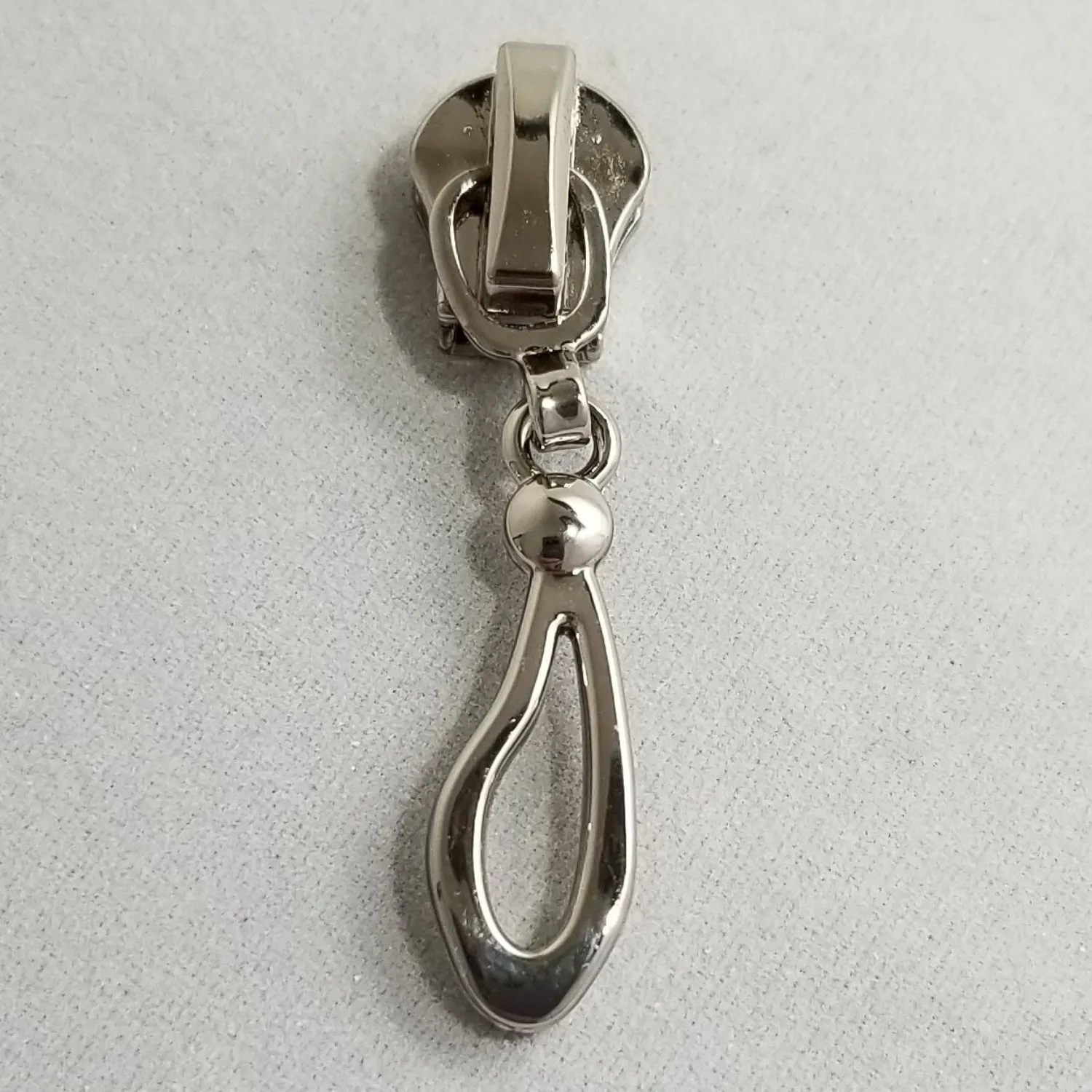 Abstract Metal Zipper Pull